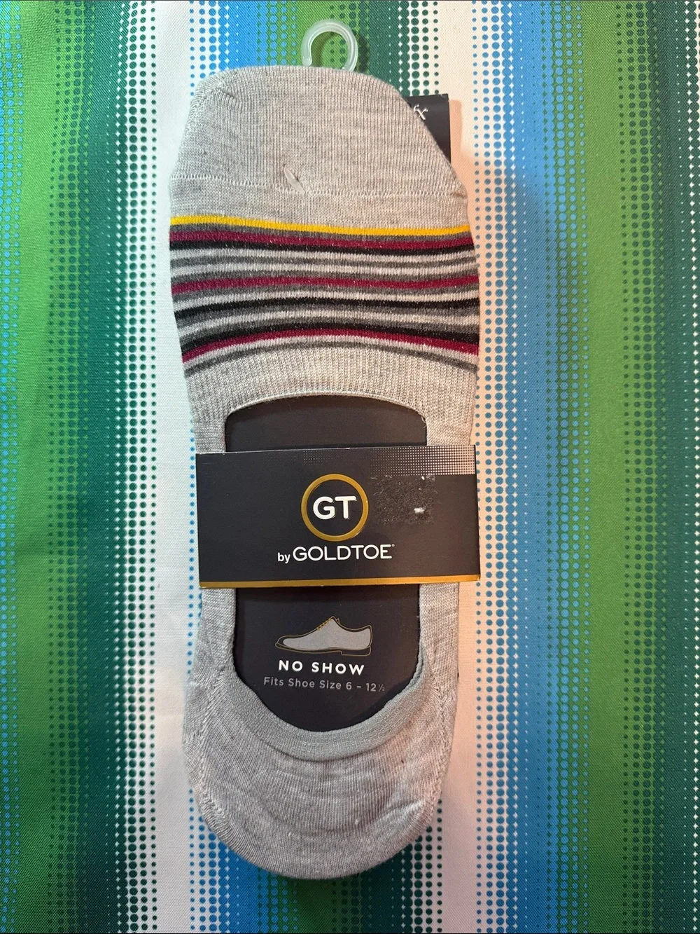 Goldtoe GT Men’s No-Show Socks in Light Gray with Stripes and other colors.